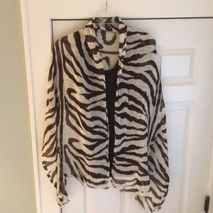 Yummy Banana Republic fringed animal print scarf.